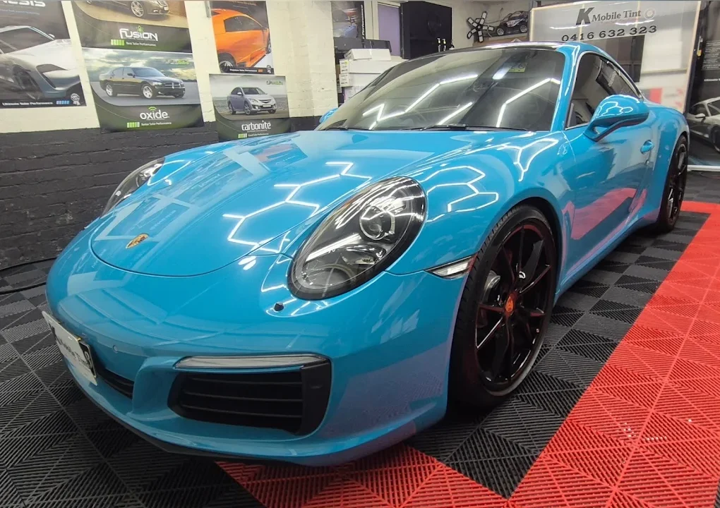 Blue Porsche 911 with window tint at K Mobile Tint